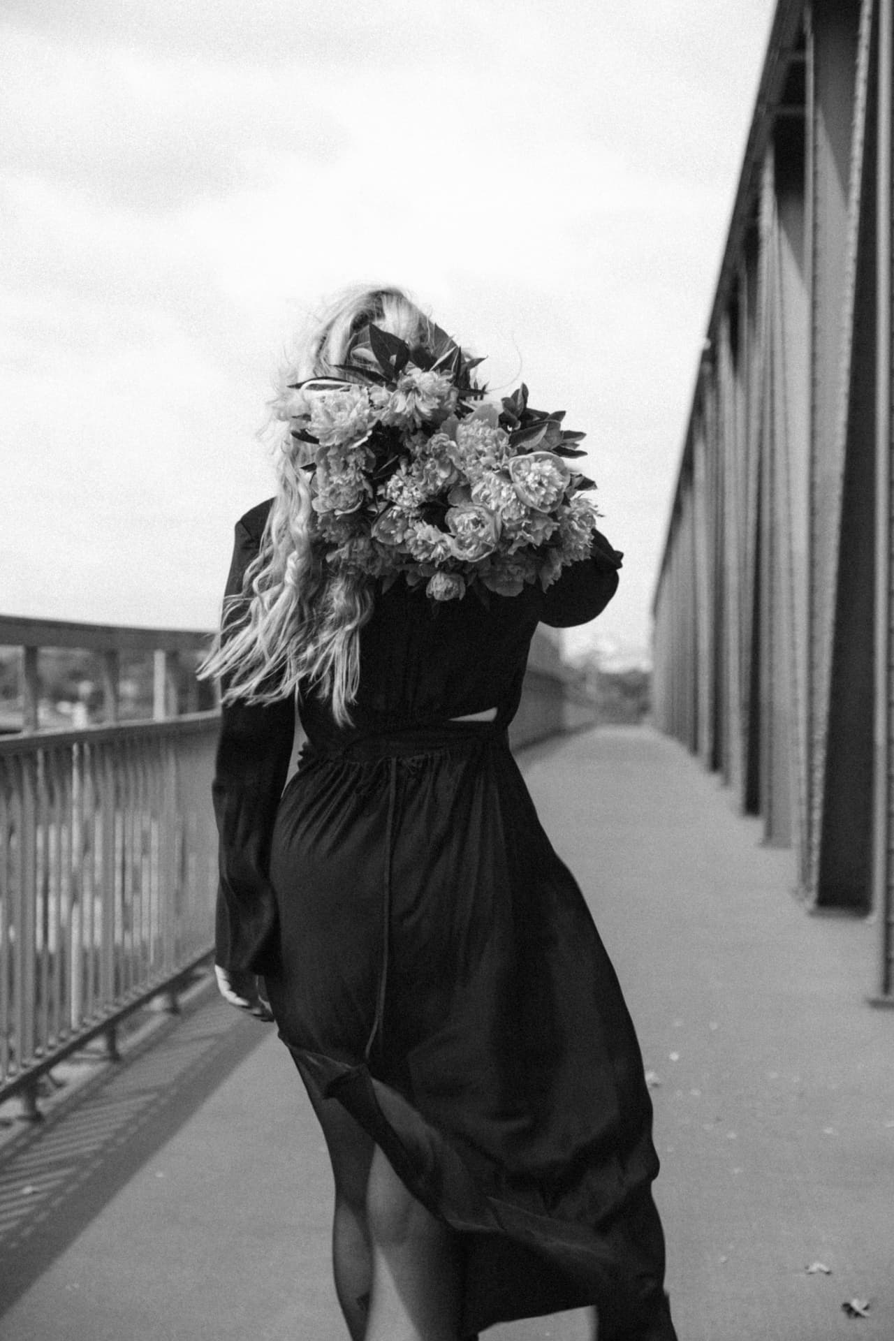 Walking on bridge with flowers