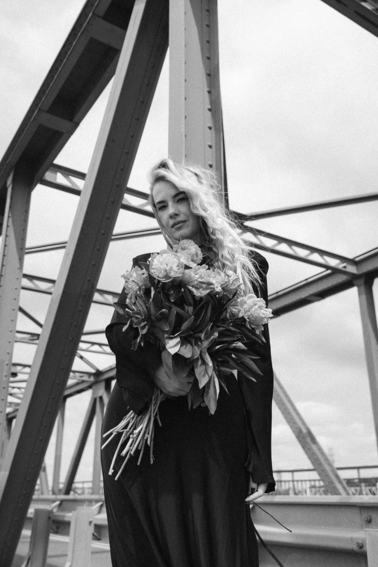 Dramatic portrait with bouquet